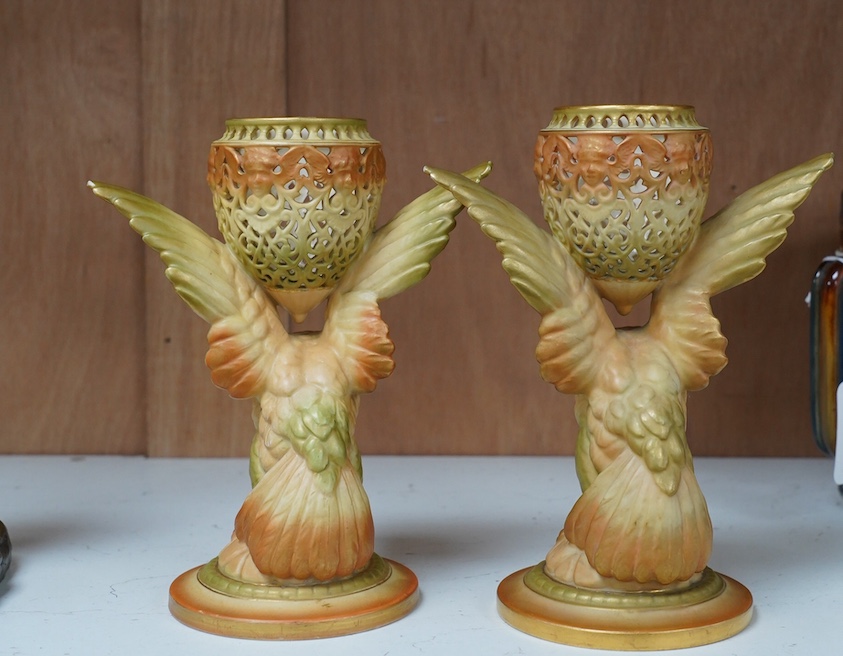 A pair of Royal Worcester blush ivory pot pourri, lacking covers, model number G11, height 9cm. Condition - good